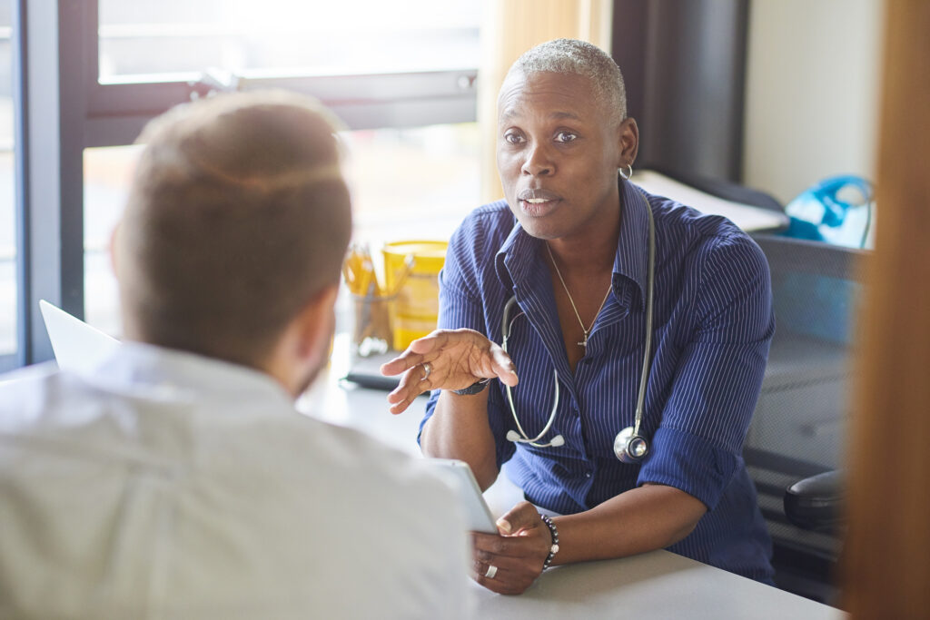 Doctor talking to a patient